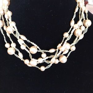 Faux pearl choker.